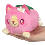 Front view of Squishable Alter Egos Strawberry Kitty Plush with pink fur, flower detail and strawberry-inspired design