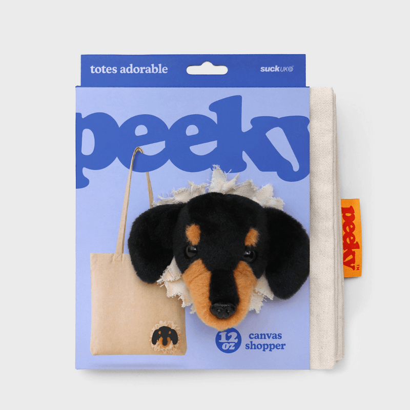 SUCK UK Peeky Dog tote bag in blue Totes Adorable packaging, displaying the black-and-tan plush puppy head and 12 oz canvas shopper label.