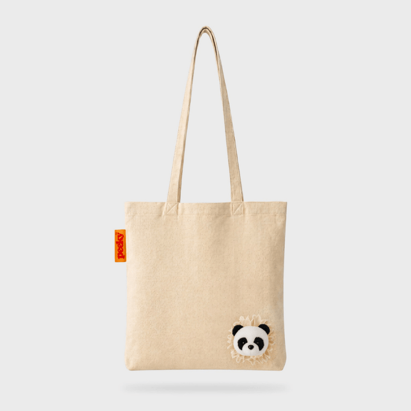 Full front view of the SUCK UK Peeky Panda natural cream cotton tote bag with long handles and a three-dimensional black-and-white panda head.