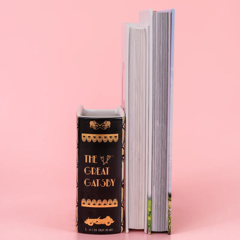Side view of Great Gatsby ceramic book vase showing sculpted pages