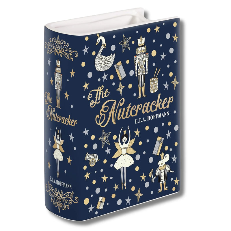 Small ceramic book vase in navy with The Nutcracker artwork in gold and white