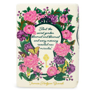 Back of The Secret Garden vase with the line about the garden blooming, framed by flowers.