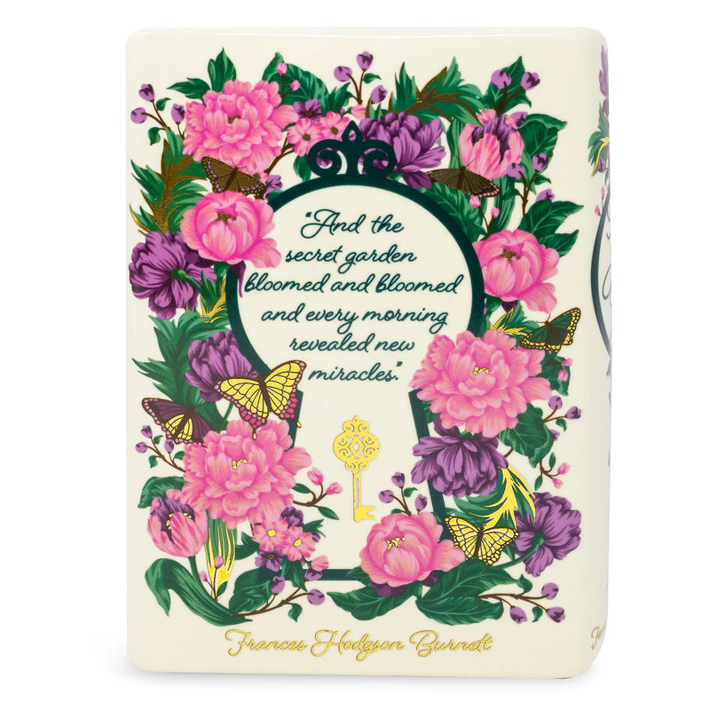 Back of The Secret Garden vase with the line about the garden blooming, framed by flowers.