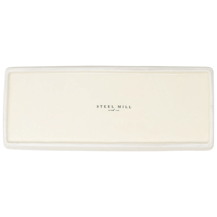 Base of The Secret Garden literary trinket tray with Steel Mill and Co logo