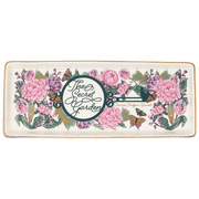 Front view of The Secret Garden ceramic trinket tray with floral design and gold details
