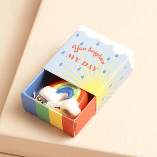 Tiny matchbox ceramic rainbow token gift with the box open, showing the rainbow inside