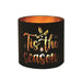 Round black and gold Tis the Season tealight candle holder shown lit