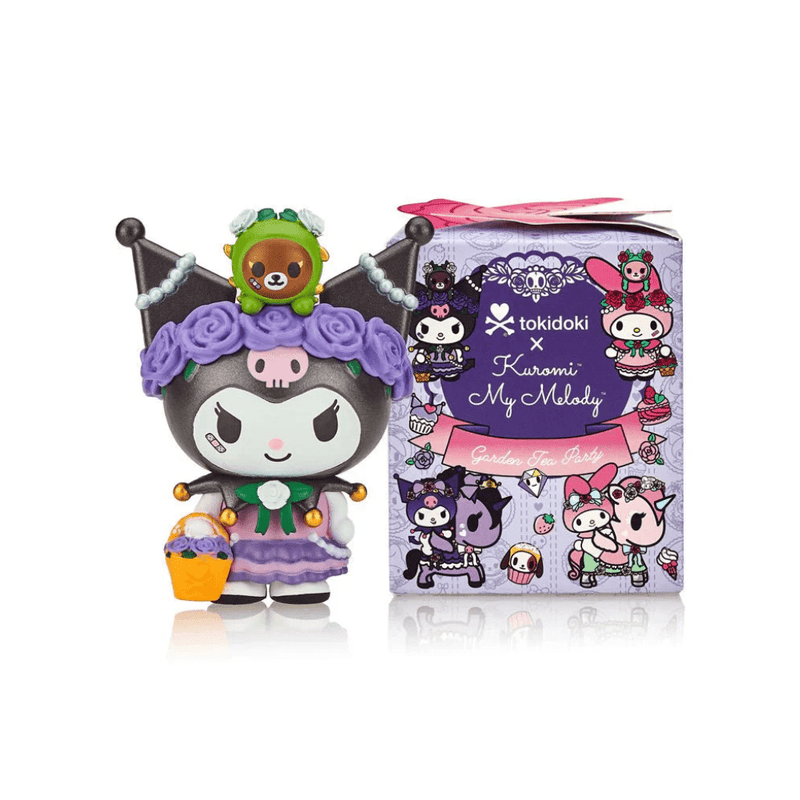 Front view of Tokidoki Kuromi × My Melody Garden Tea Party blind-box packaging in lilac, showing illustrated characters and cupcake motifs—ideal for collectors.










