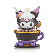 Tokidoki collectible Kuromi Rose Tea miniature sitting in ornate black-and-purple teacup, whipped-cream hat and gold clover spoon visible.
