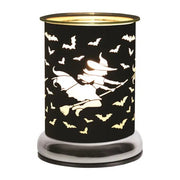 Halloween touch wax melt burner with witch flying on broom and bats glowing

