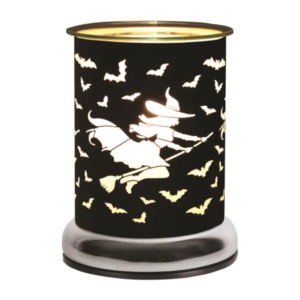 Halloween touch wax melt burner with witch flying on broom and bats glowing

