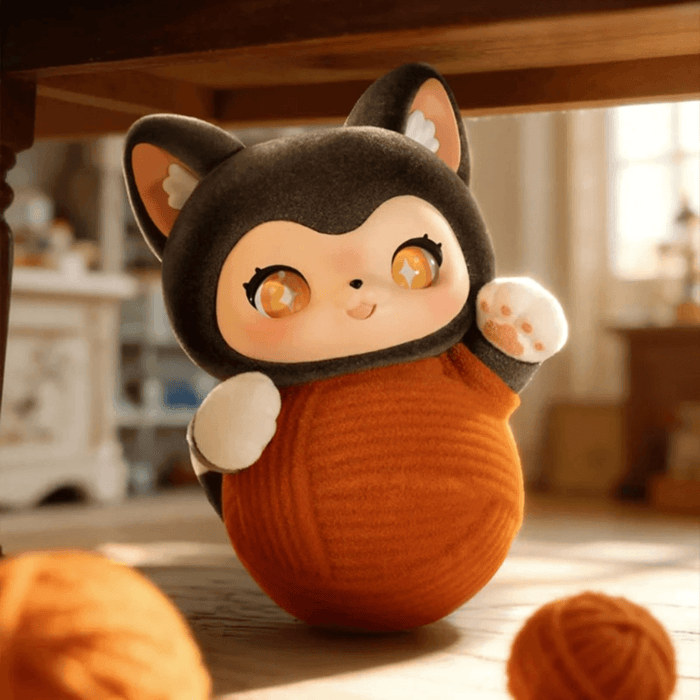 TOYZEROPLUS MOFFY’s Magic Furry Mewky Hide-and-Seek blind box figure wrapped in an orange ball of yarn