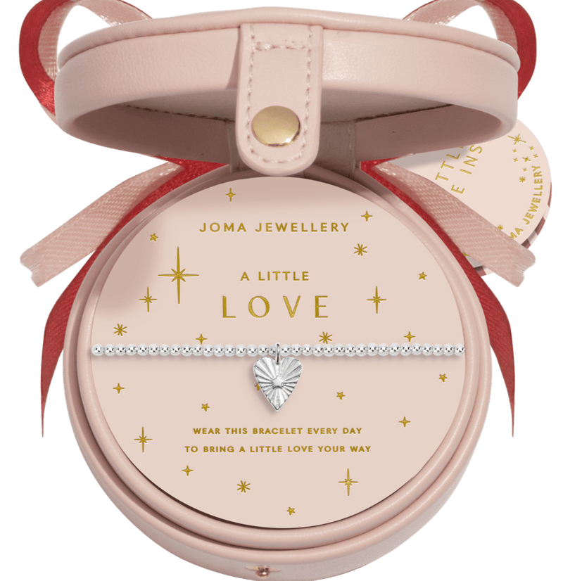 “Cut‑out packshot of ‘A Little Love’ bracelet bauble with bow”

