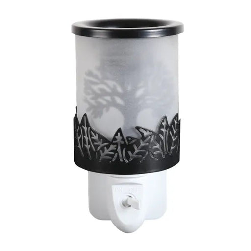 Black Tree of Life plug in wax melt burner unlit with frosted panel and cut-out leaf detailing around the lower edge.