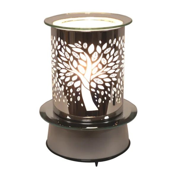 Lit electric carousel wax melt burner with Tree of Life cut-out design

