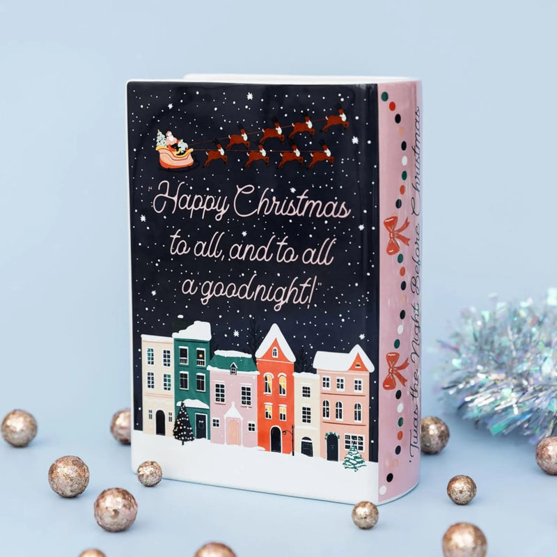 Back of Twas the Night Before Christmas book vase showing Santa sleigh and festive quote