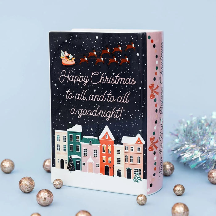 Back of Twas the Night Before Christmas book vase showing Santa sleigh and festive quote