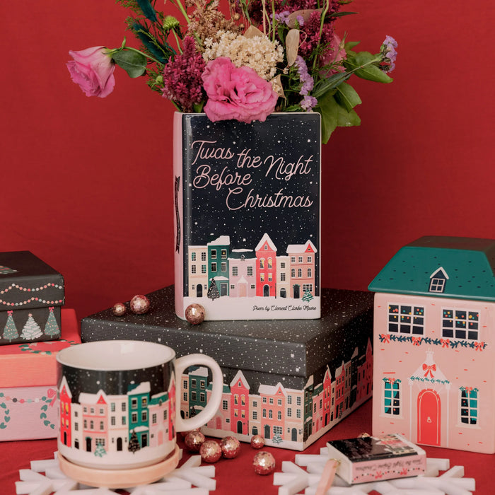 Twas the Night Before Christmas book vase styled with flowers beside matching mug and gift boxes