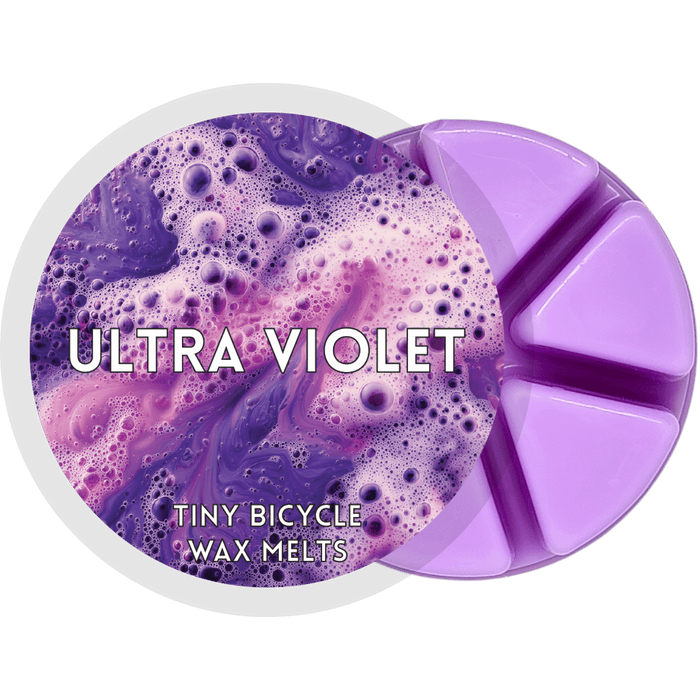 Ultra Violet segmented wax melt pot with purple wax segments and violet bubble-style label design