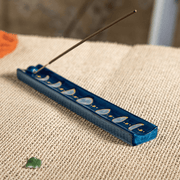 Urban Tokyo moon phase ceramic incense holder styled on woven surface