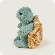 Left profile of plush baby turtle from Warmies

