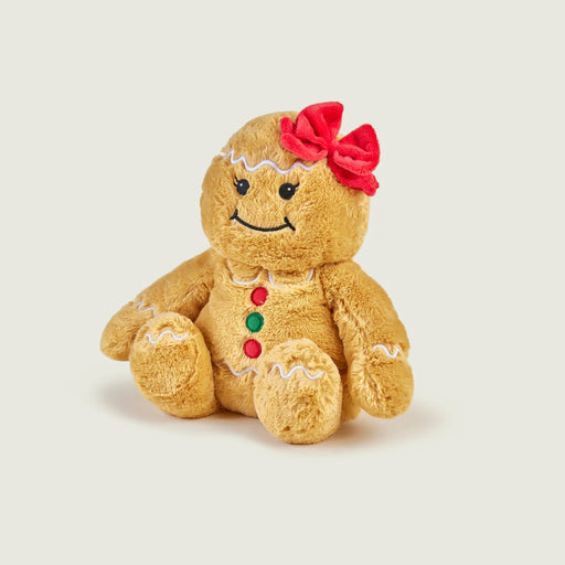 Warmies Gingerbread Girl heatable plush with red bow, three-quarter view.