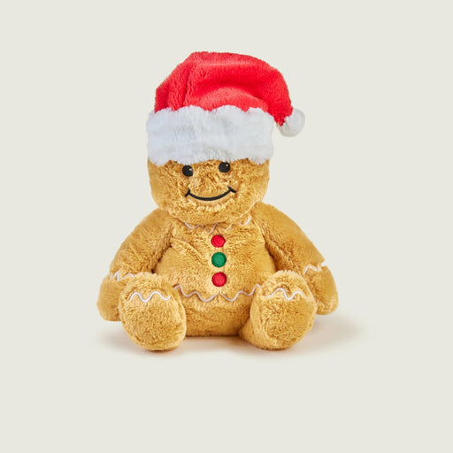 Warmies Gingerbread Man heatable plush wearing a red Santa hat, front view.