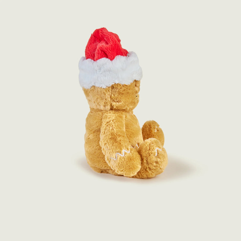 Side profile of Warmies Gingerbread Man heatable plush toy.