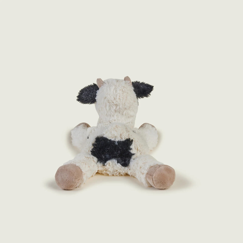 Back view of Warmies Laying Cow with black heart-shaped spot
