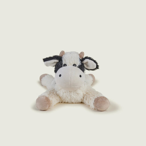 Warmies Laying Cow plush toy lying flat with a cute smile