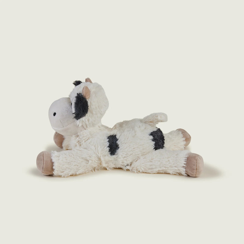 Side view of Warmies Laying Cow showing soft black spots
