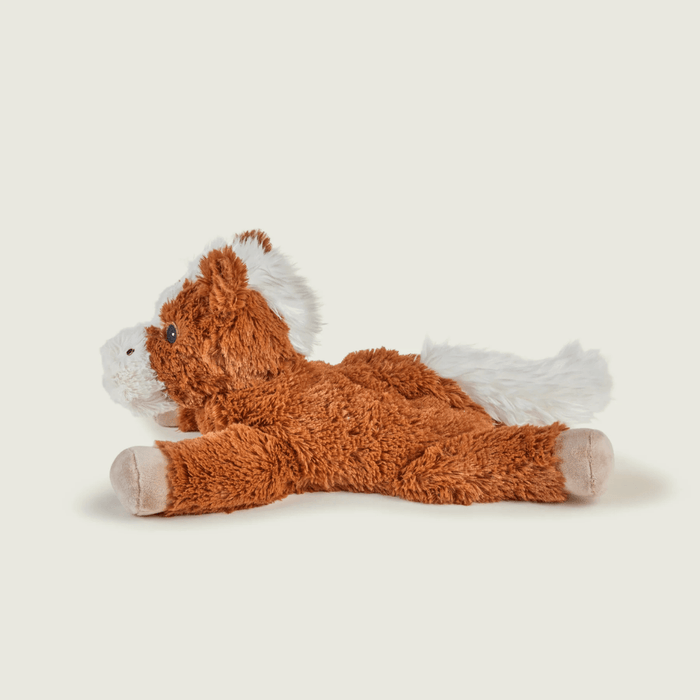 Left side view of Warmies Laying Horse plush toy