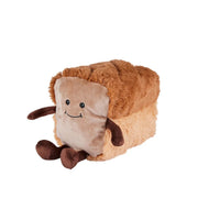 Diagonal angle of Warmies bread plush toy with smiling face


