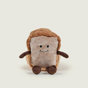 Warmies Loaf of Bread plush toy with embroidered face and soft brown crust

