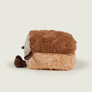 Side profile of Warmies bread-shaped heatable plush toy

