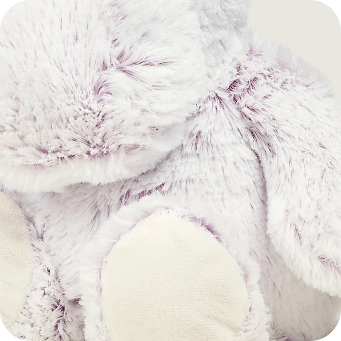 Close-up of Warmies Marshmallow Hippo plush fur and paw detail