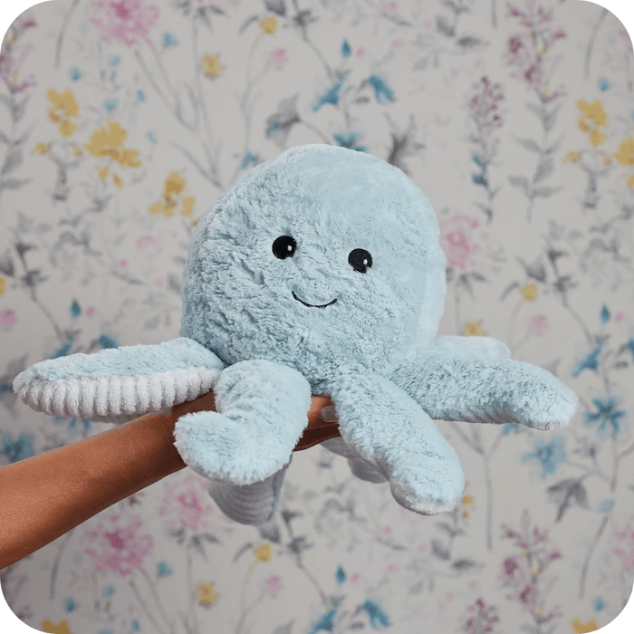 Warmies Octopus plush toy held in hand