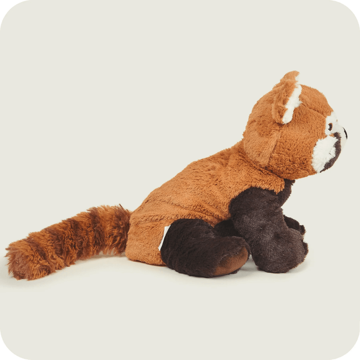 Side view of Warmies Red Panda heatable plush toy