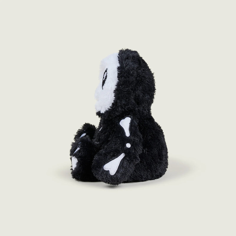 Side profile of Warmies Skeleton plush showing arm bone detail


