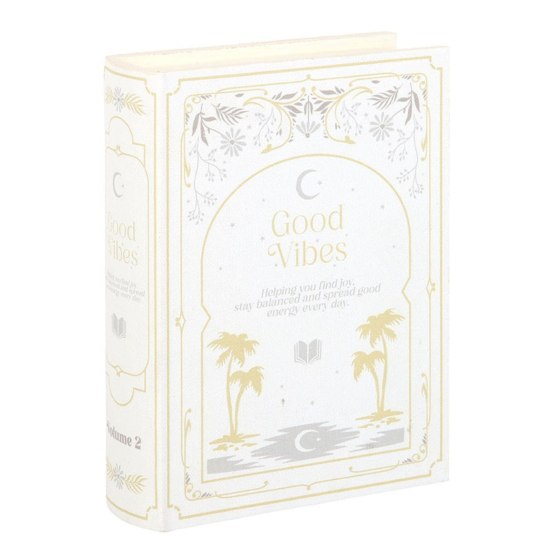 Open white book shaped storage box showing hidden compartment