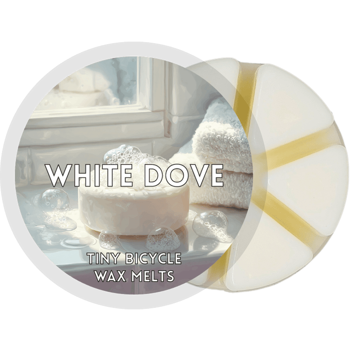 White Dove segmented wax melt pot with creamy white wax segments and clean bathroom-style label design