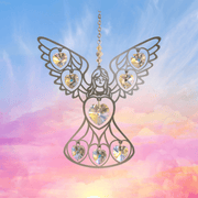 Large angel crystal suncatcher glowing against a pastel sunrise sky, ready to scatter rainbows

