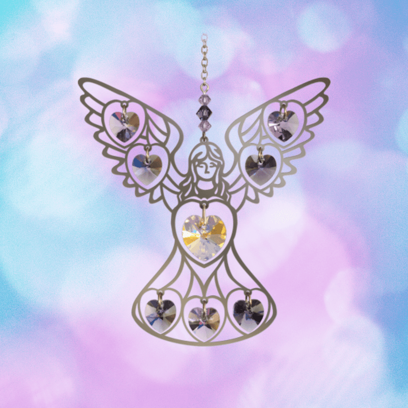 Angel suncatcher with shimmering purple hearts glowing against a pastel sky backdrop

