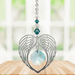 Blue zircon angel wing heart birthstone crystal suncatcher on white background
