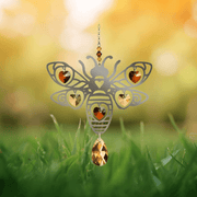 Bee crystal suncatcher glowing among autumn grass, ready to scatter warm golden rainbows

