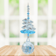 Wild Things Aquamarine Birthstone (March) crystal suncatcher in window with clear and blue crystals and 20mm ball pendant