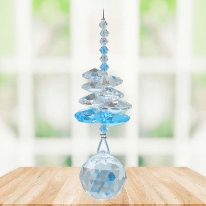 Wild Things Aquamarine Birthstone (March) crystal suncatcher in window with clear and blue crystals and 20mm ball pendant