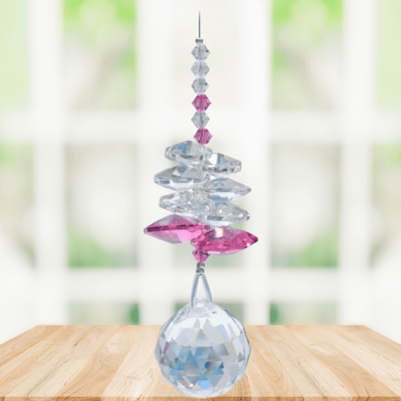 Wild Things Rose Birthstone (October) crystal suncatcher in window with clear and pink crystals and 20mm ball pendant