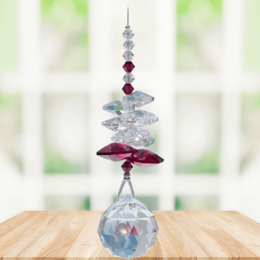 Wild Things Ruby Birthstone (July) crystal suncatcher in window with clear crystals and 20mm ball pendant