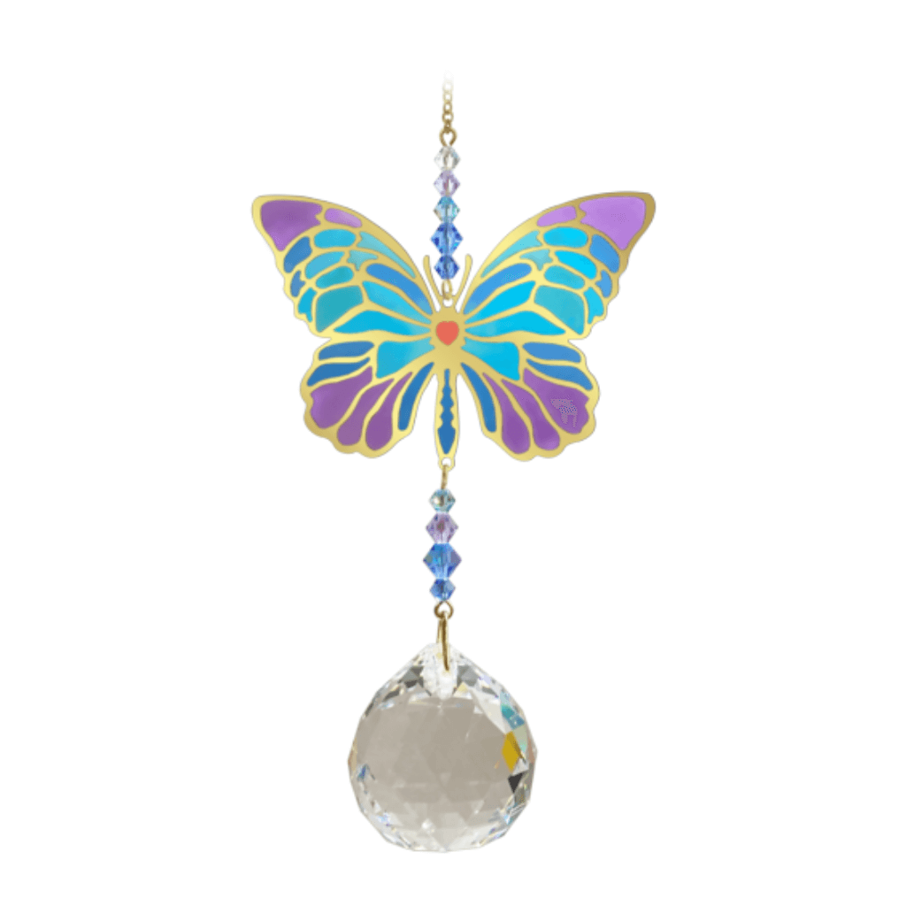 Butterfly Iris Crystal Suncatcher on white backdrop: stained-glass-effect wings, lavender-blue bead run, and large crystal prism pendant.
